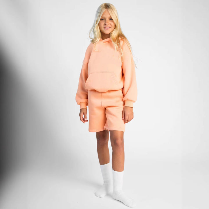 Damernas casual hoodie och shorts set i mjukt material med praktiska fickor Mirla-Eva Jonsson