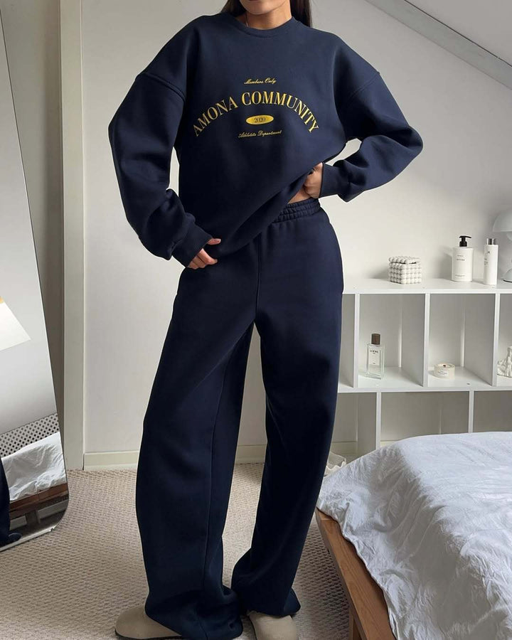 Damernas casual oversized sweatshirt med kreativt textdesign och bekväma joggingsbyxor Mirla-Eva Jonsson