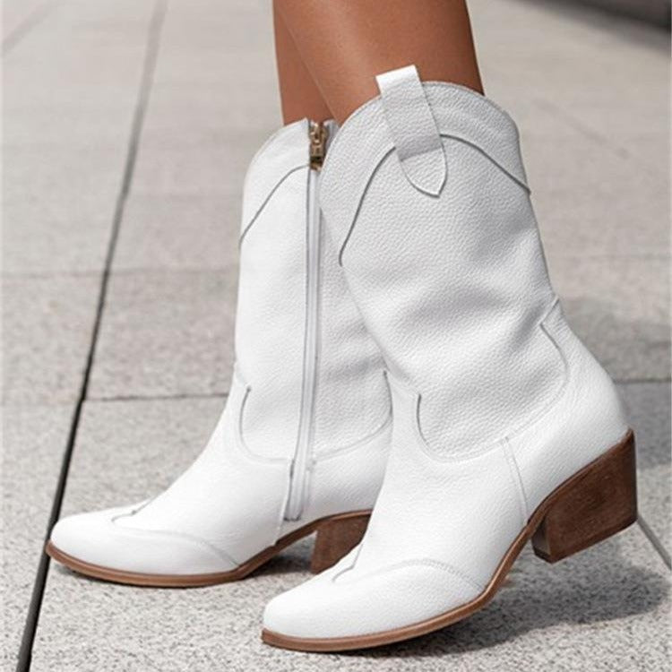 Damernas cowboystövlar med elegant blixtlås och trendig design Mirla-Eva Jonsson