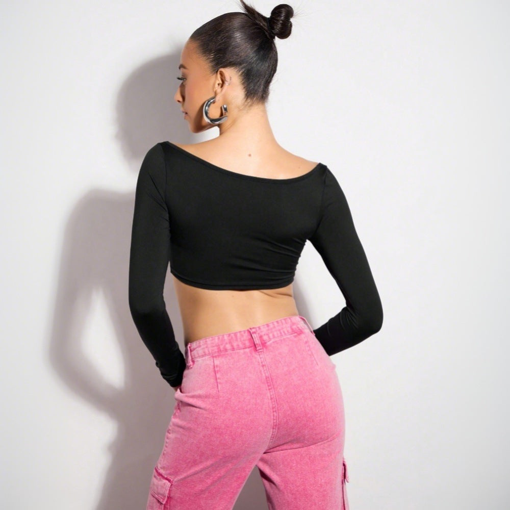 Damernas crop top med asymmetrisk skärning och långa ärmar Mirla-Eva Jonsson