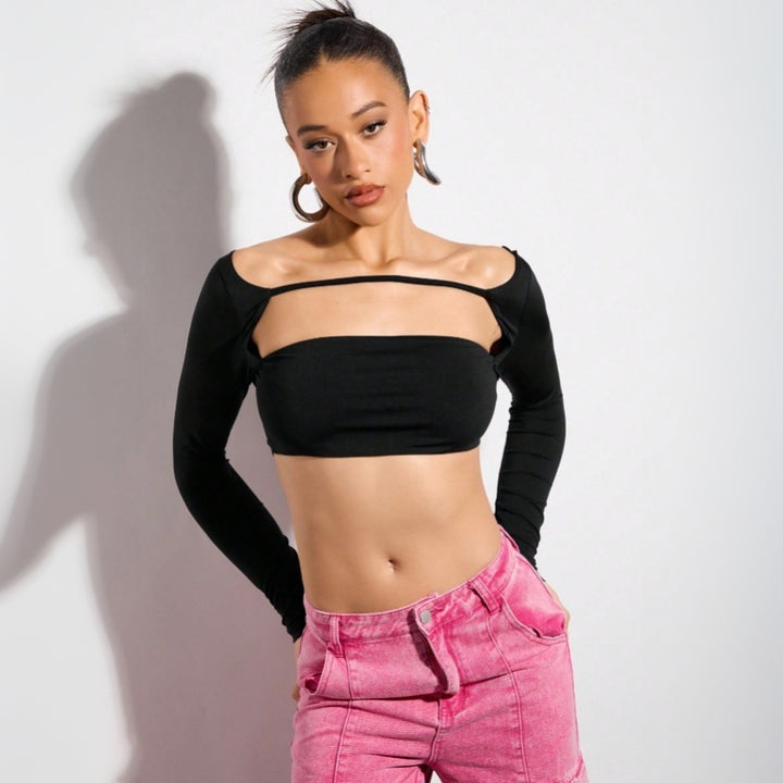 Damernas crop top med asymmetrisk skärning och långa ärmar Mirla-Eva Jonsson