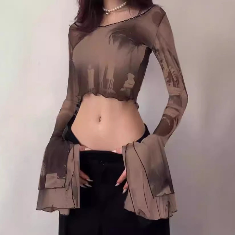 Damernas crop-top med transparenta ärmar och konstnärlig tryck Mirla-Eva Jonsson