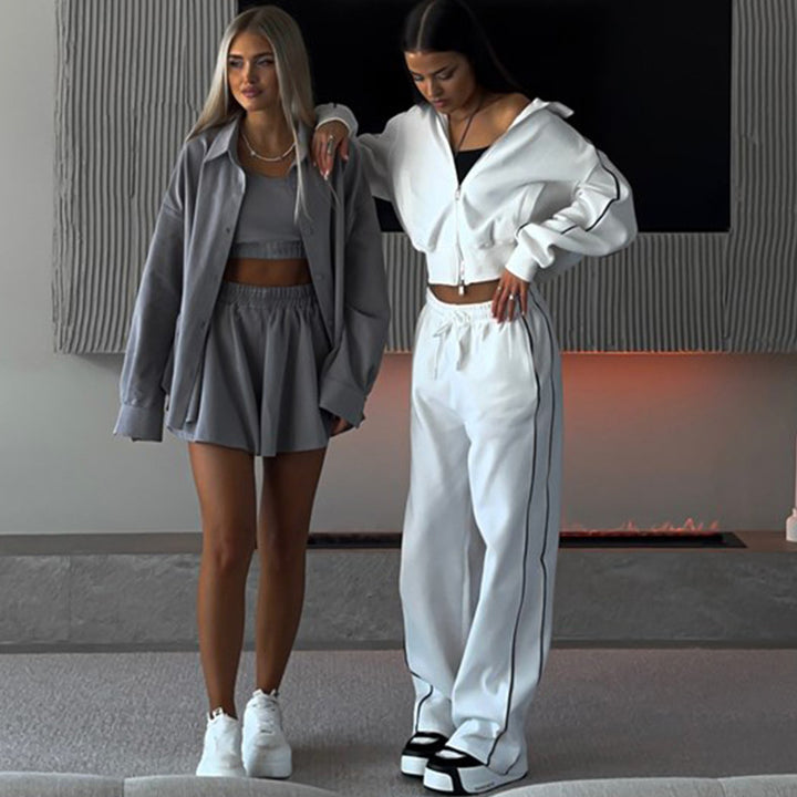 Damernas cropped huvtröja med dragkedja och sportiga joggingbyxor Mirla-Eva Jonsson