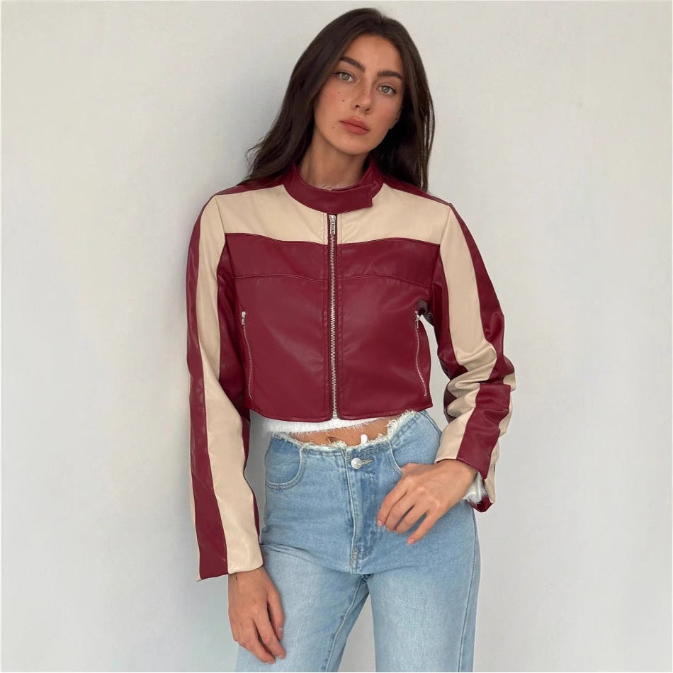 Damernas cropped konstläderjacka med kontrasterande insatser Mirla-Eva Jonsson