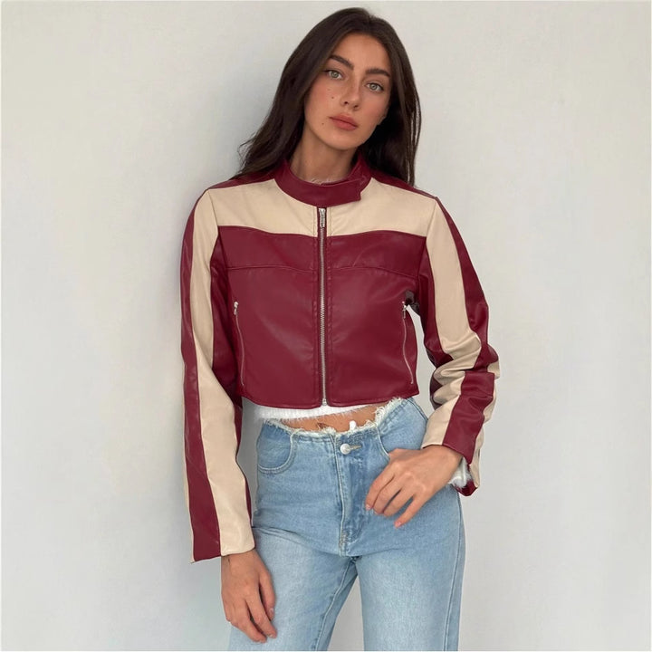 Damernas cropped konstläderjacka med kontrasterande insatser Mirla-Eva Jonsson