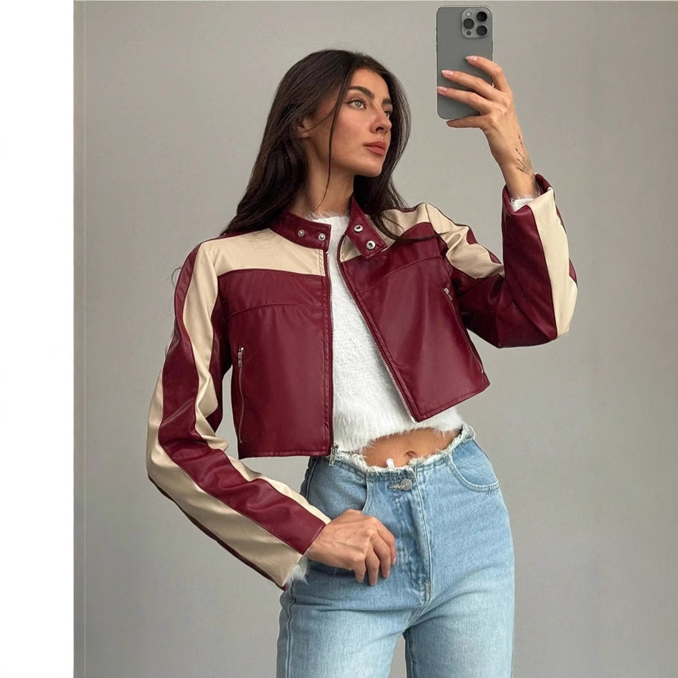 Damernas cropped konstläderjacka med kontrasterande insatser Mirla-Eva Jonsson