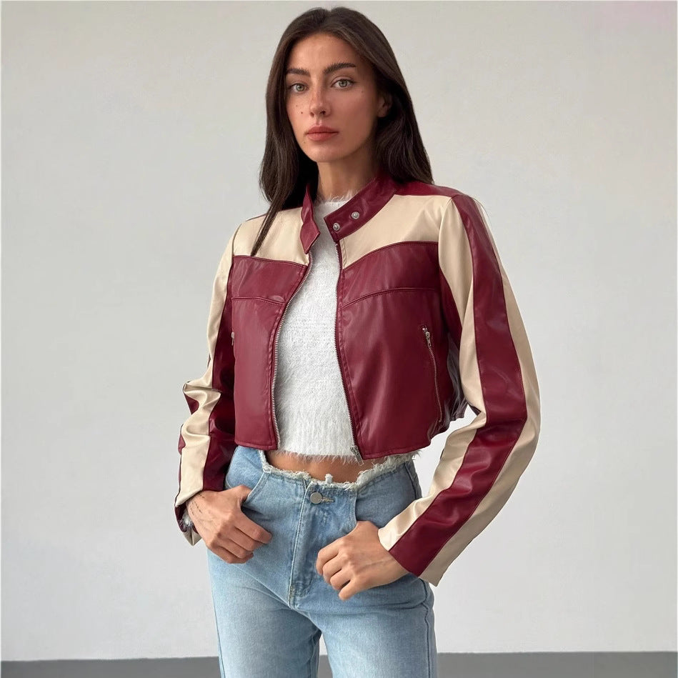 Damernas cropped konstläderjacka med kontrasterande insatser Mirla-Eva Jonsson