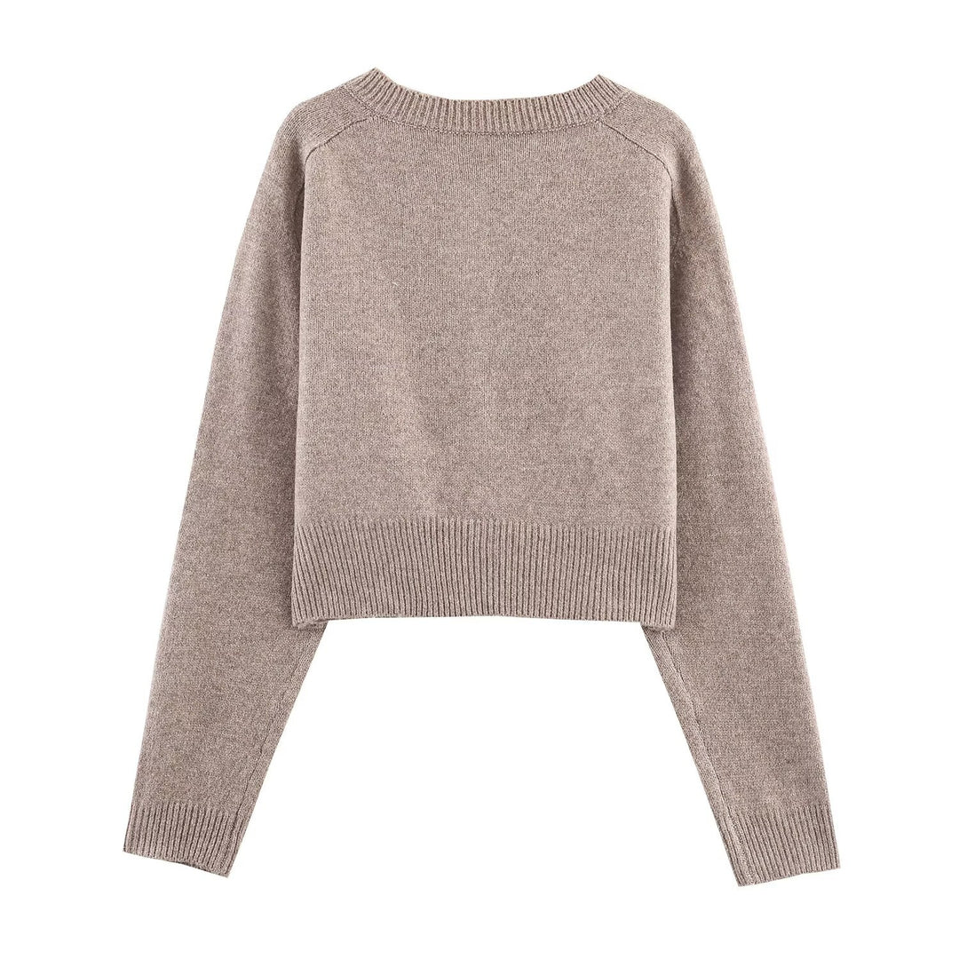 Damernas cropped stickad jacka Mirla-Eva Jonsson