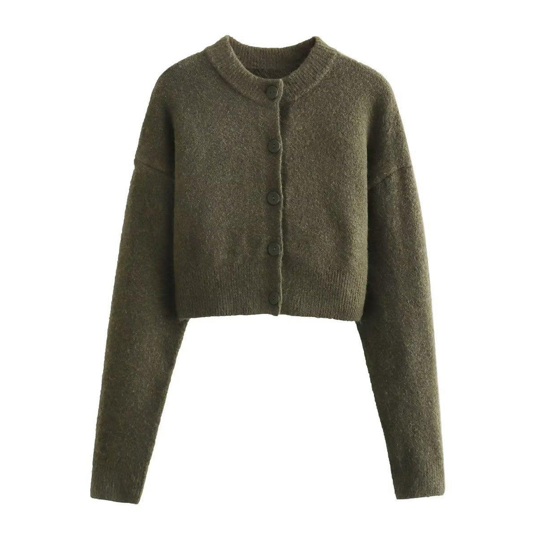Damernas cropped stickad jacka med moderna knappar Mirla-Eva Jonsson