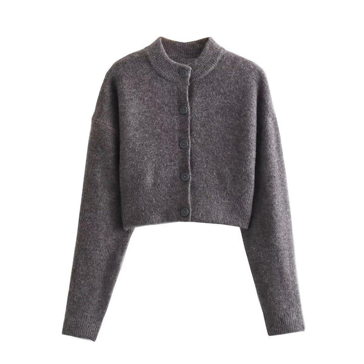 Damernas cropped stickad jacka med moderna knappar Mirla-Eva Jonsson