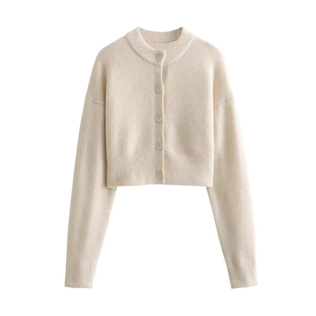 Damernas cropped stickad jacka med moderna knappar Mirla-Eva Jonsson