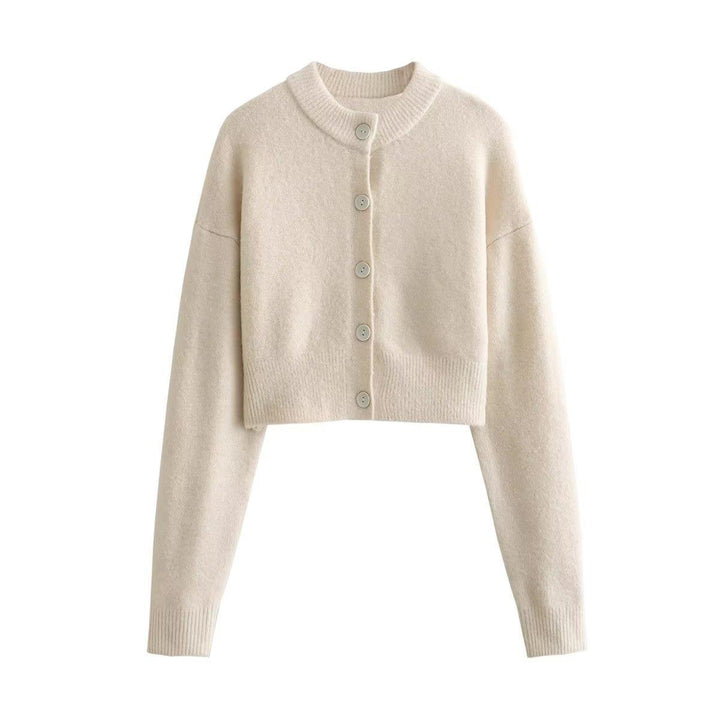 Damernas cropped stickad jacka med moderna knappar Mirla-Eva Jonsson