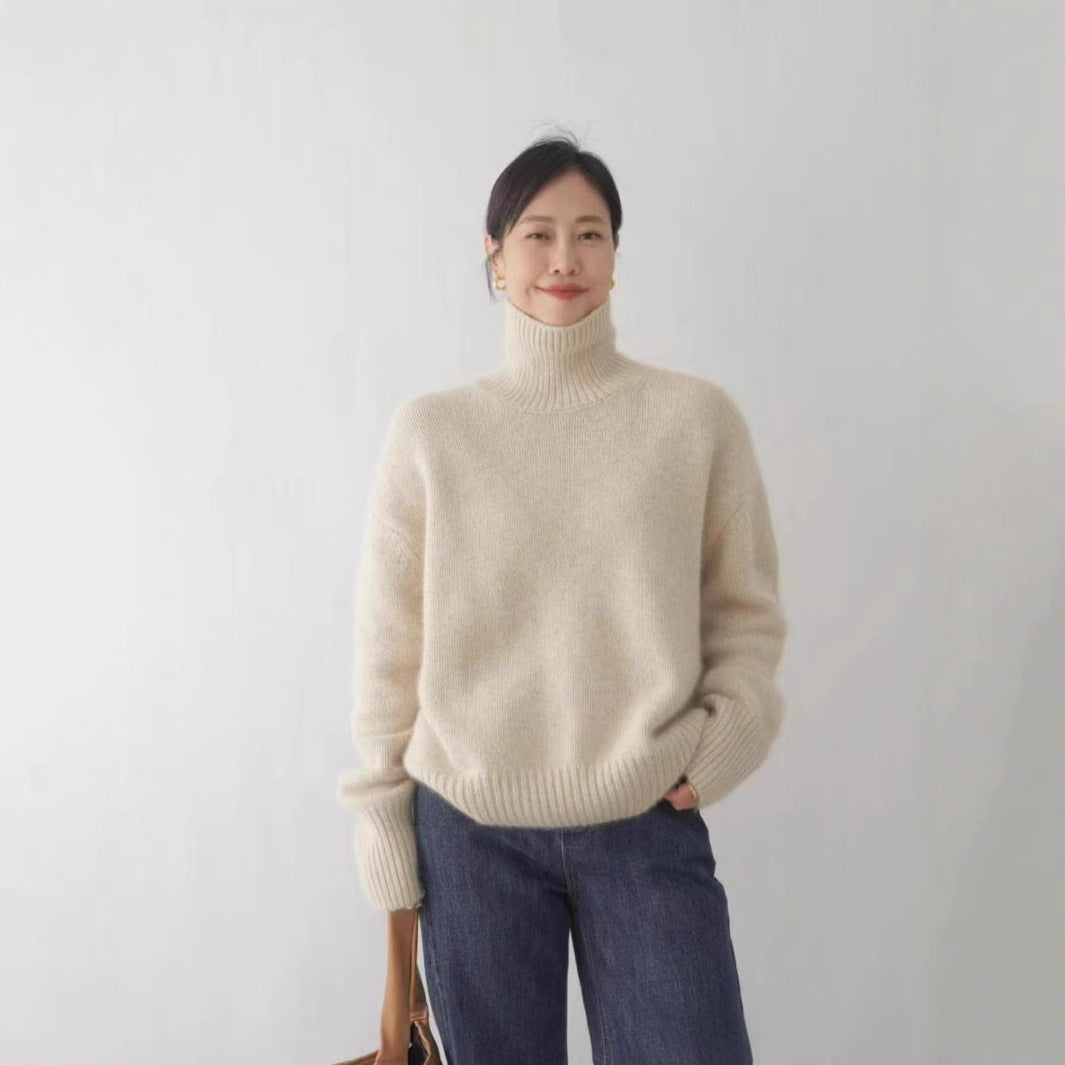 Damernas designer-halsduk-tröja gjord av högkvalitativ ull Mirla-Eva Jonsson