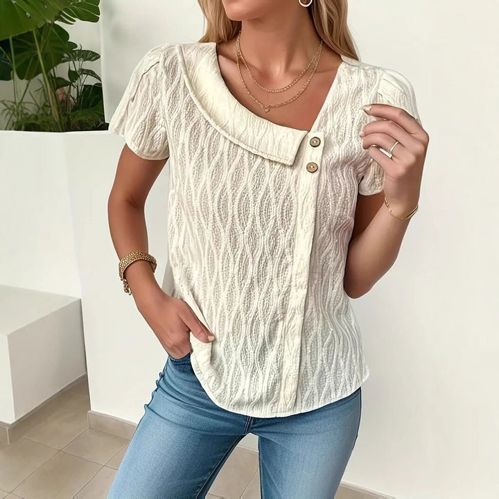 Damernas designermodell med strukturerad överdel och knappryck Mirla-Eva Jonsson