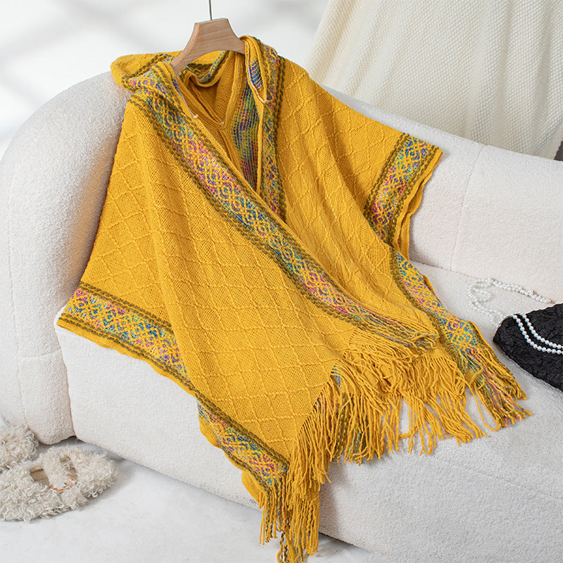 Damernas elegant poncho med högkvalitativ strukturdesign och fransar Mirla-Eva Jonsson