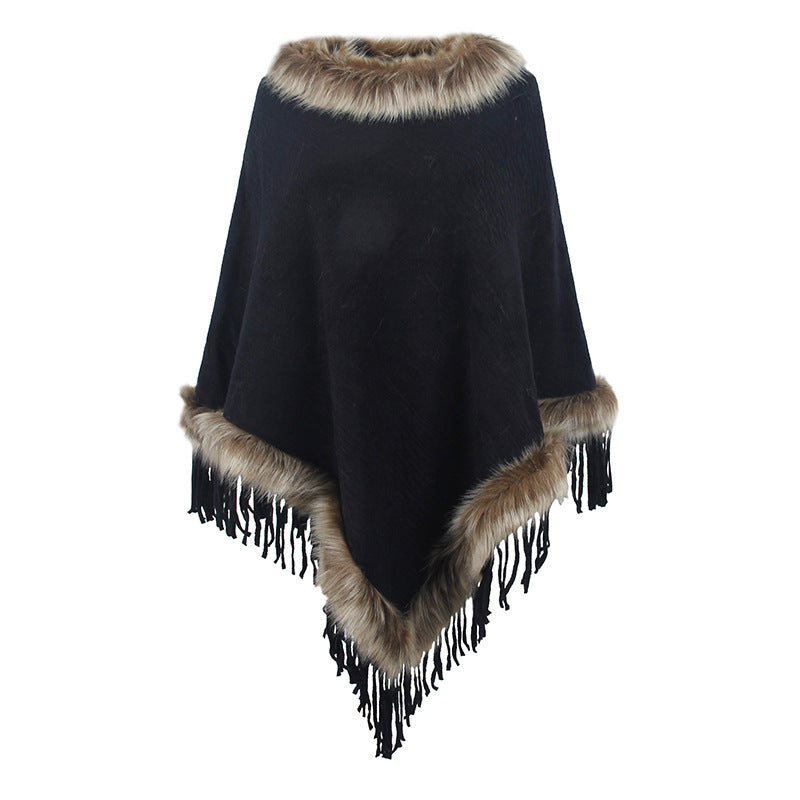 Damernas elegant poncho med lyxig fuskpälskrage och dekadenta fransar Mirla-Eva Jonsson