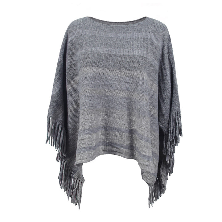 Damernas elegant poncho med strukturerad design och fransiga detaljer Mirla-Eva Jonsson