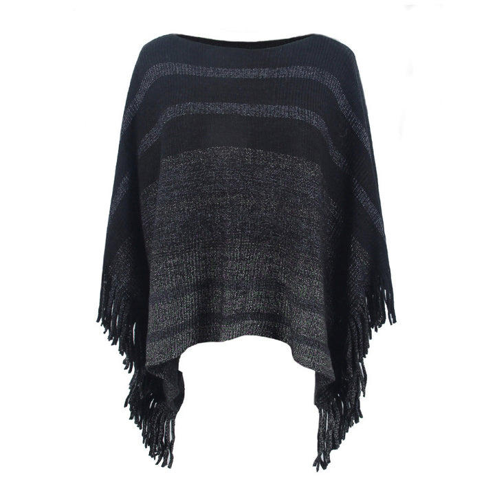 Damernas elegant poncho med strukturerad design och fransiga detaljer Mirla-Eva Jonsson