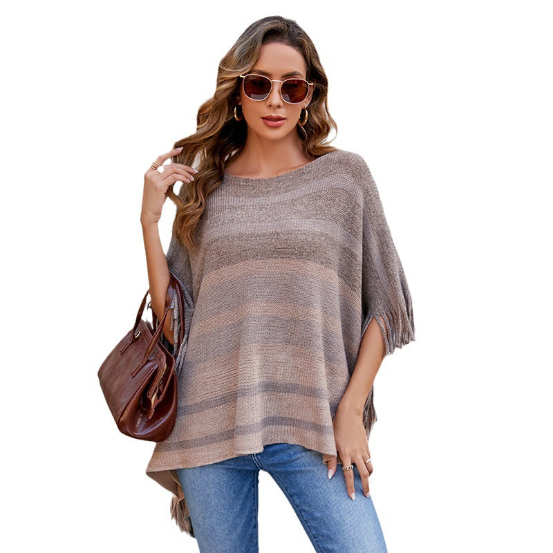 Damernas elegant poncho med strukturerad design och fransiga detaljer Mirla-Eva Jonsson