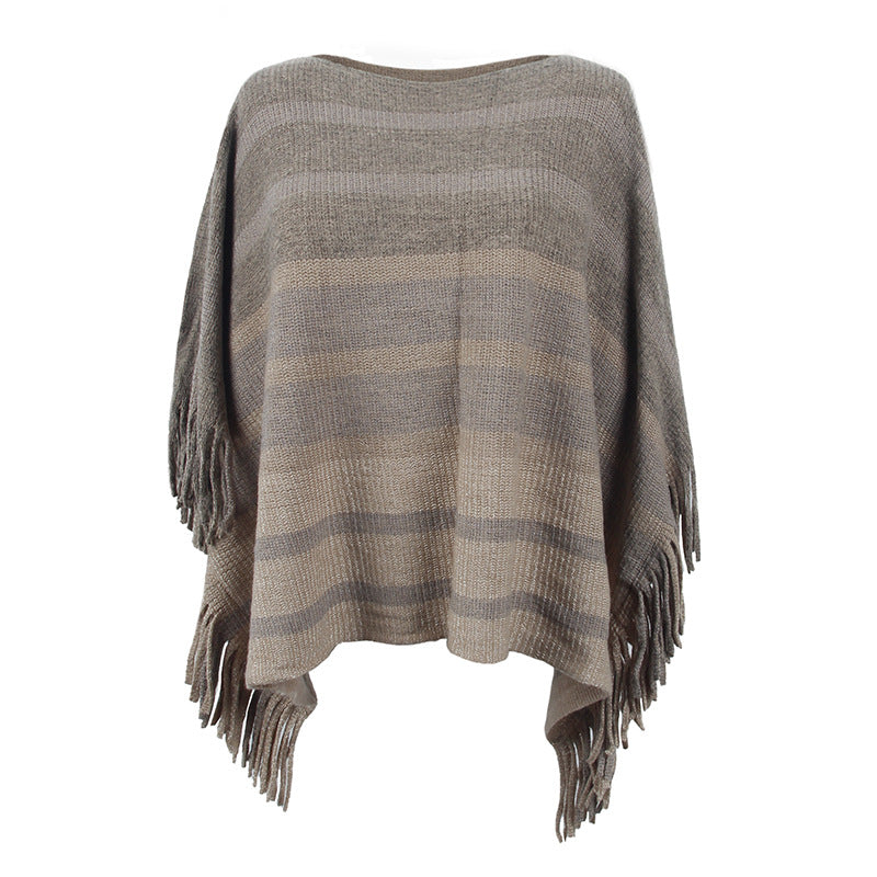 Damernas elegant poncho med strukturerad design och fransiga detaljer Mirla-Eva Jonsson