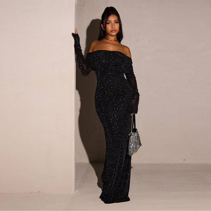 Damernas elegant strapless maxiklänning med glittrande detaljer Mirla-Eva Jonsson