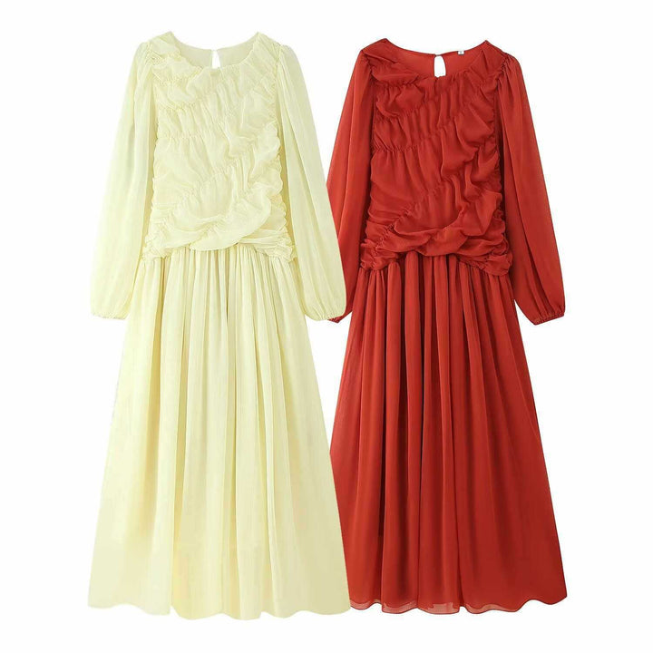 Damernas eleganta Maxiklänning med voluminösa volanger och elegant snitt Mirla-Eva Jonsson
