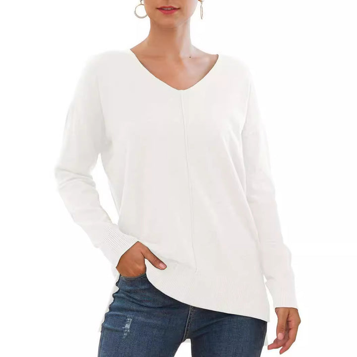 Damernas eleganta V-ringad tröja med asymmetrisk nederkant Mirla-Eva Jonsson
