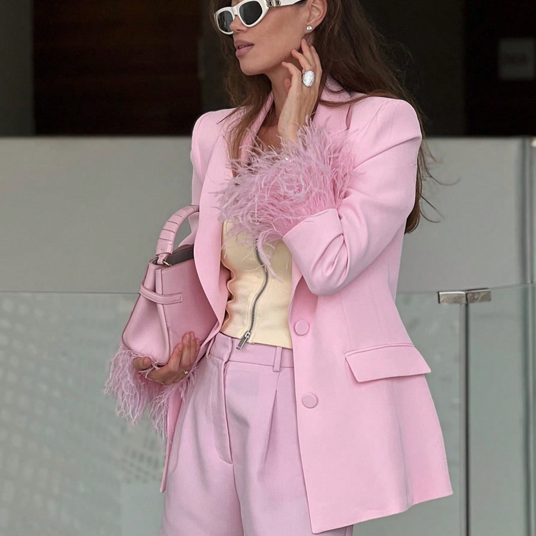 Damernas eleganta blazer med iögonfallande fjärr ärmar Mirla-Eva Jonsson