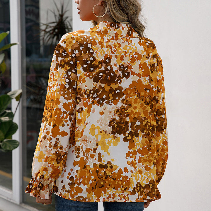 Damernas eleganta blus med blommönster och vida ärmar Eva Jonsson-Eva Jonsson