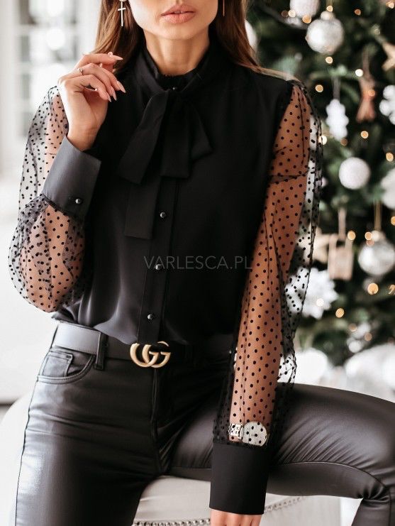 Damernas eleganta blus med genomskinliga puffärmar och slinga detalj Mirla-Eva Jonsson