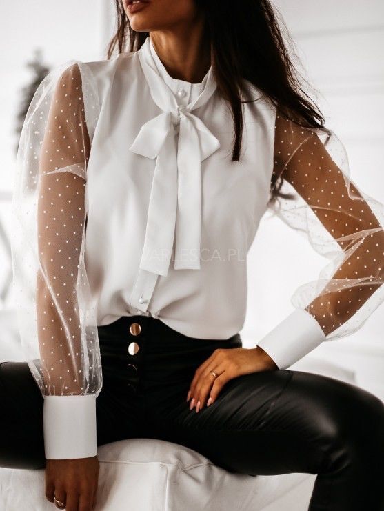 Damernas eleganta blus med genomskinliga puffärmar och slinga detalj Mirla-Eva Jonsson