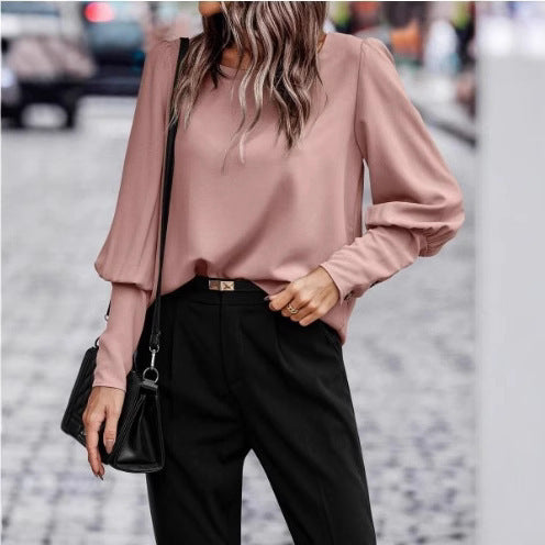 Damernas eleganta blus med puffärmsdetaljer och strukturerad tyg Mirla-Eva Jonsson