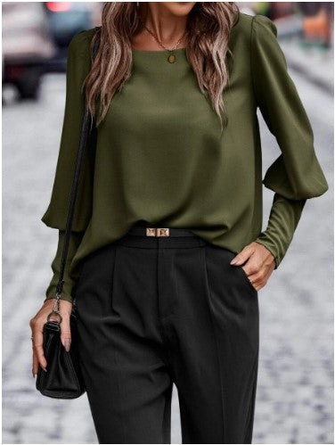 Damernas eleganta blus med puffärmsdetaljer och strukturerad tyg Mirla-Eva Jonsson