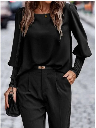Damernas eleganta blus med puffärmsdetaljer och strukturerad tyg Mirla-Eva Jonsson