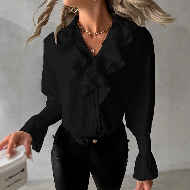 Damernas eleganta blus med voluminösa volanger Mirla-Eva Jonsson
