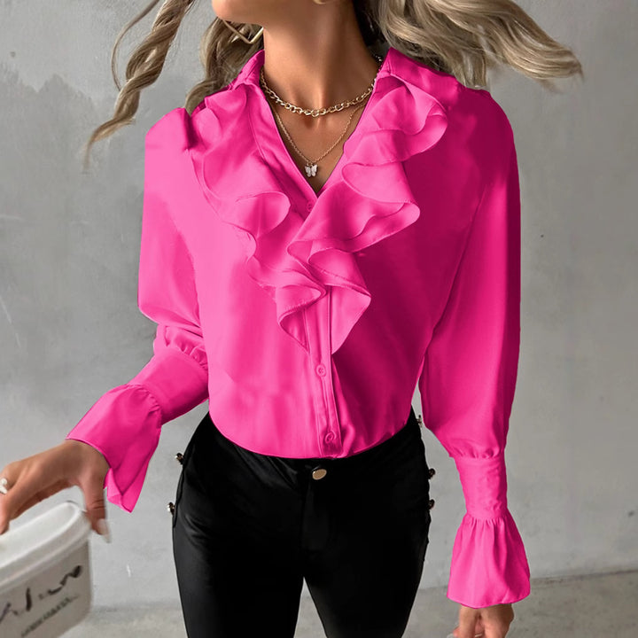 Damernas eleganta blus med voluminösa volanger Mirla-Eva Jonsson