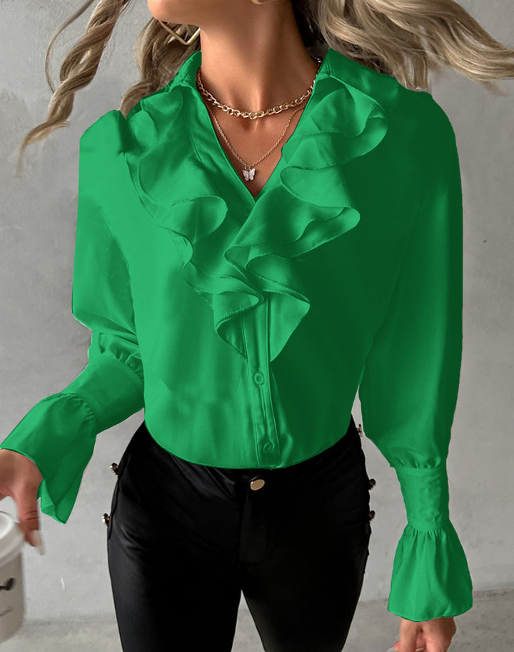 Damernas eleganta blus med voluminösa volanger Mirla-Eva Jonsson