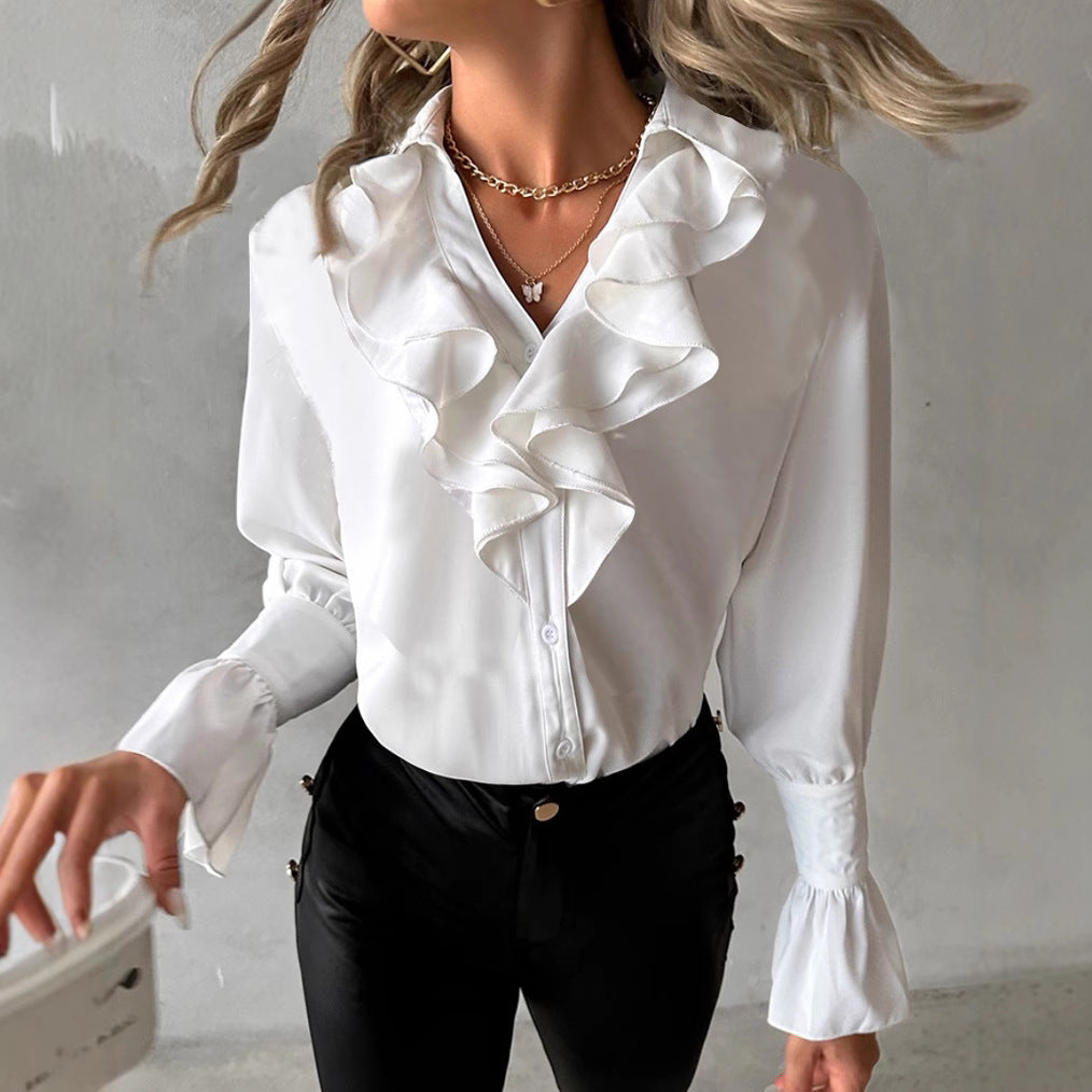 Damernas eleganta blus med voluminösa volanger Mirla-Eva Jonsson