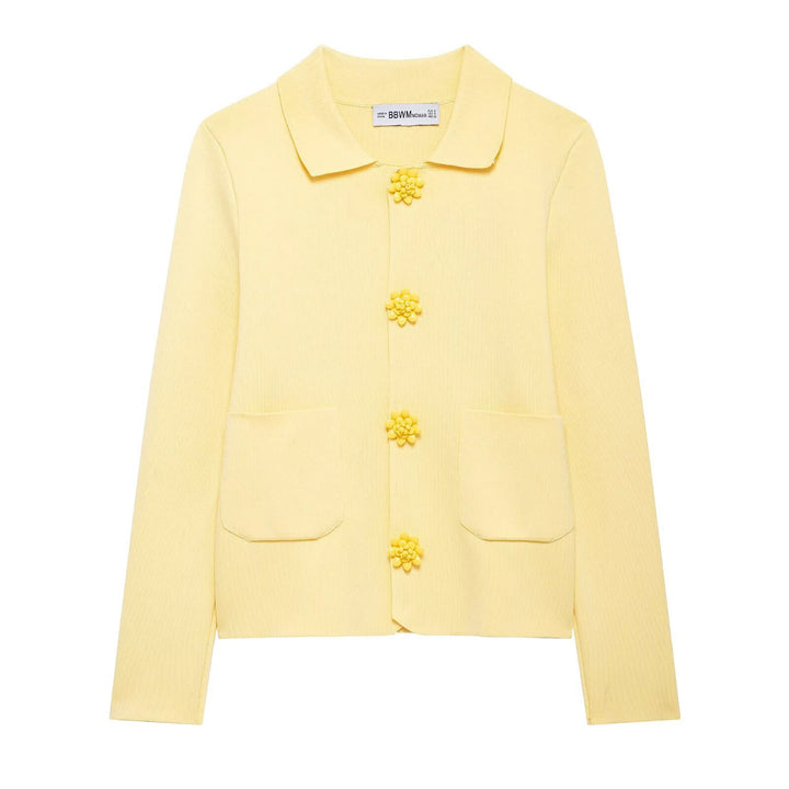 Damernas eleganta cardigan med dekorativa knappar Mirla-Eva Jonsson
