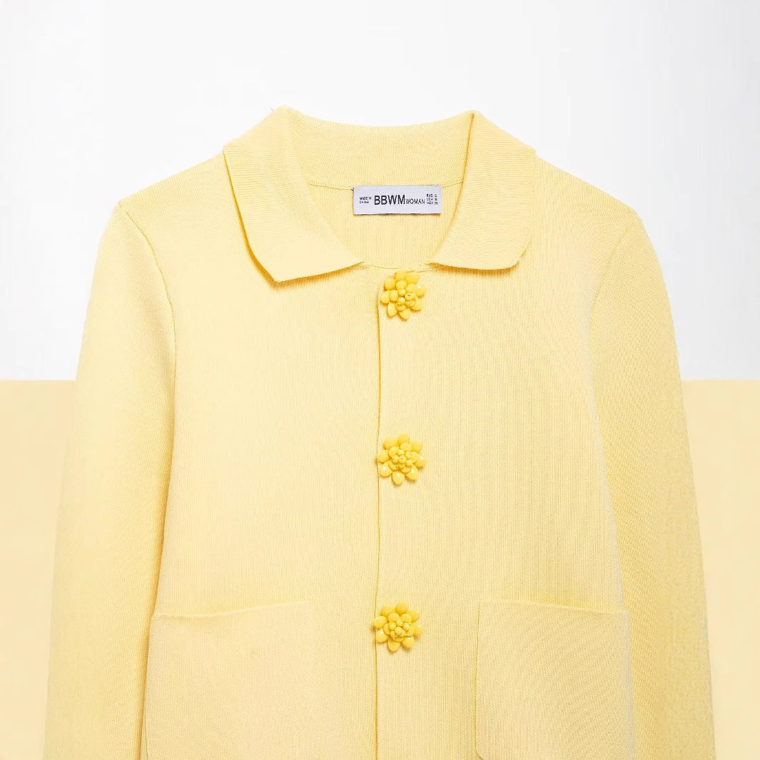 Damernas eleganta cardigan med dekorativa knappar Mirla-Eva Jonsson