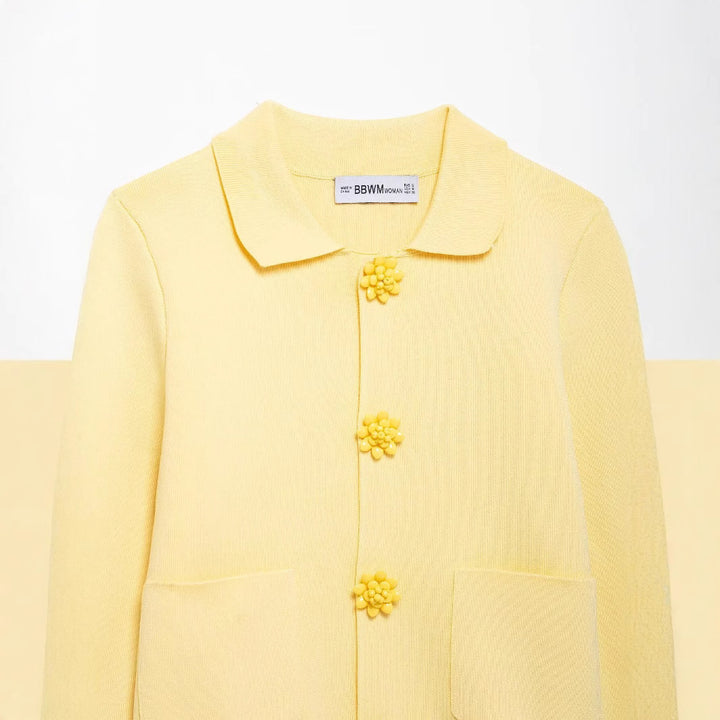 Damernas eleganta cardigan med dekorativa knappar Mirla-Eva Jonsson