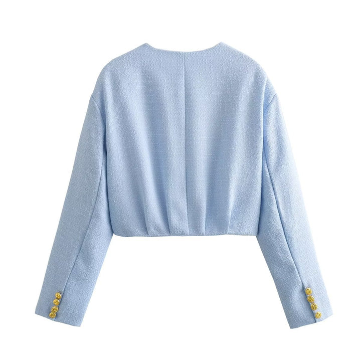 Damernas eleganta cropped jacka med gyllene knapplik detaljer Mirla-Eva Jonsson