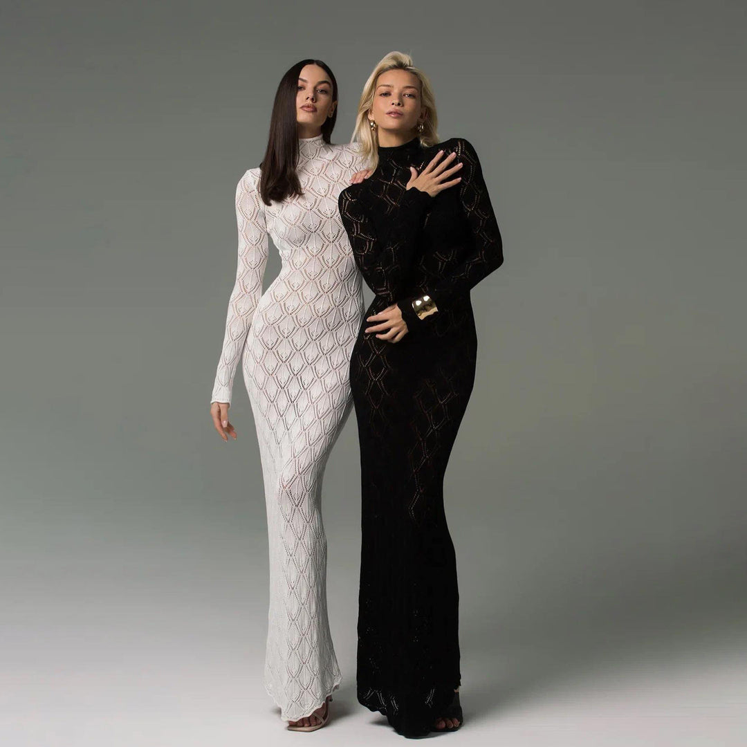Damernas eleganta, figurnära designklänning med hög krage och transparenta detaljer Mirla-Eva Jonsson