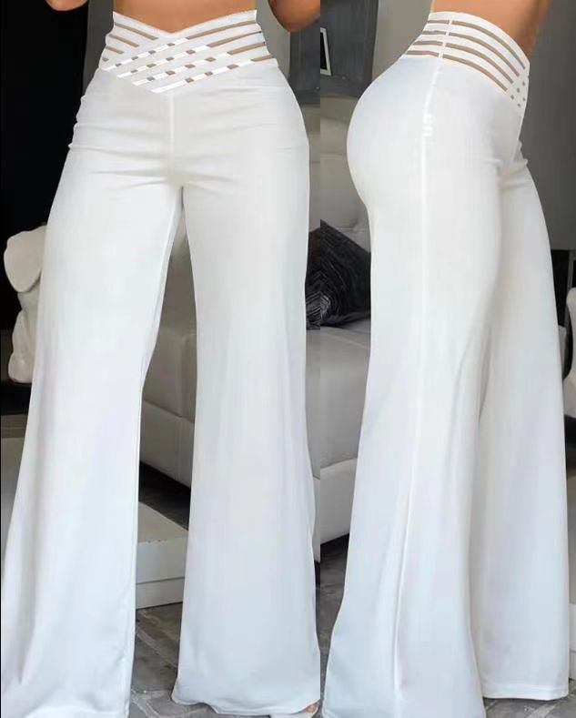 Damernas eleganta hög midja palazzo byxor med cut-out detaljer Eva Jonsson-Eva Jonsson