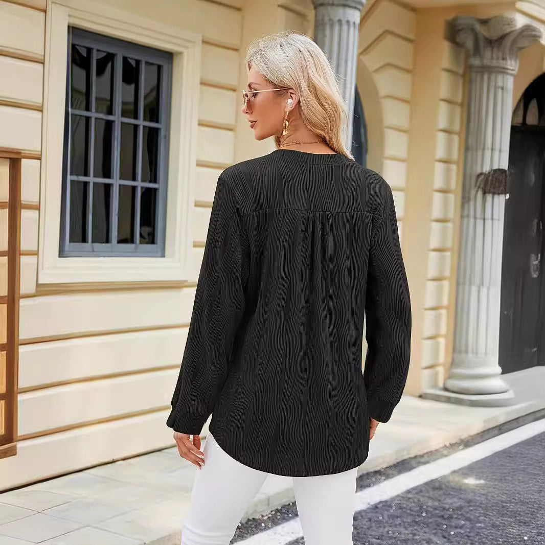 Damernas eleganta långärmad blus med strukturerad design Mirla-Eva Jonsson