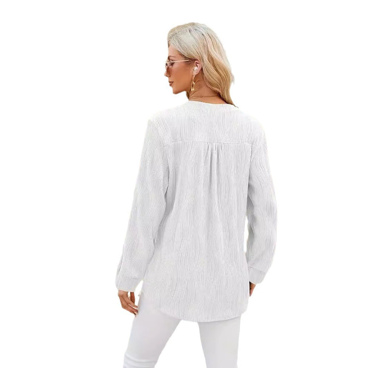 Damernas eleganta långärmad blus med strukturerad design Mirla-Eva Jonsson