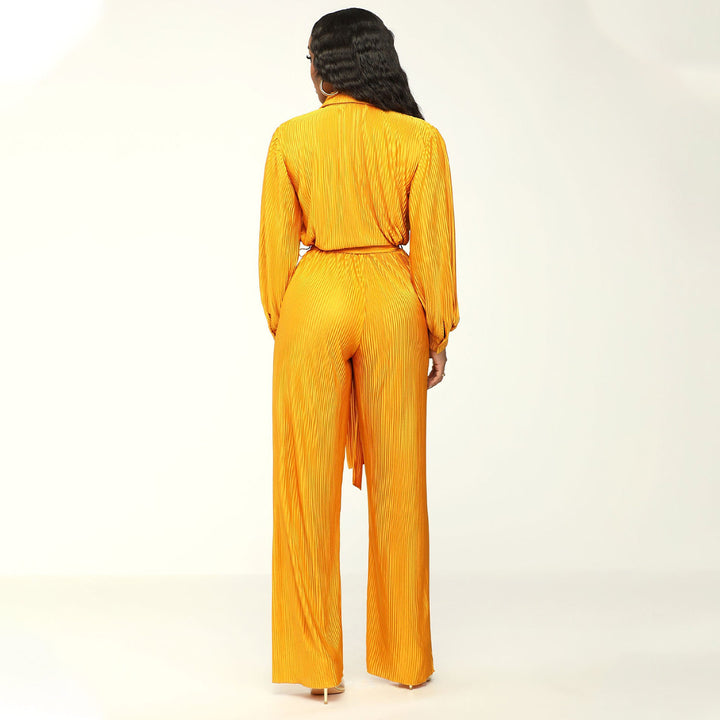 Damernas eleganta långärmad jumpsuit med figursydd midjedetalj Mirla-Eva Jonsson