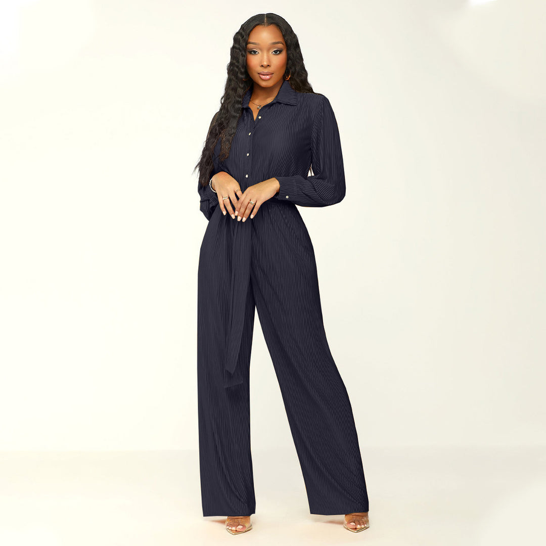 Damernas eleganta långärmad jumpsuit med figursydd midjedetalj Mirla-Eva Jonsson