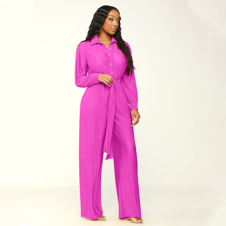 Damernas eleganta långärmad jumpsuit med figursydd midjedetalj Mirla-Eva Jonsson