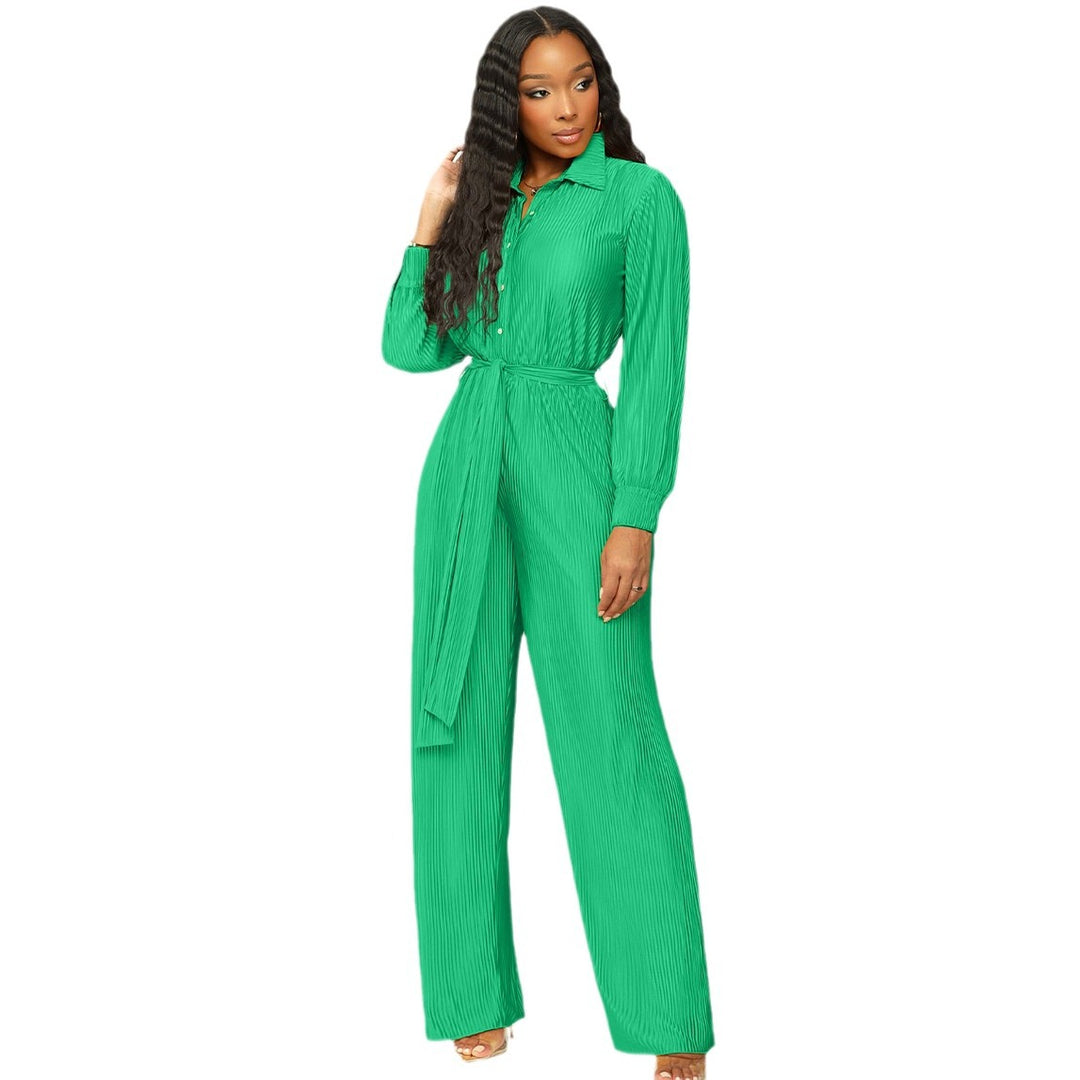 Damernas eleganta långärmad jumpsuit med figursydd midjedetalj Mirla-Eva Jonsson
